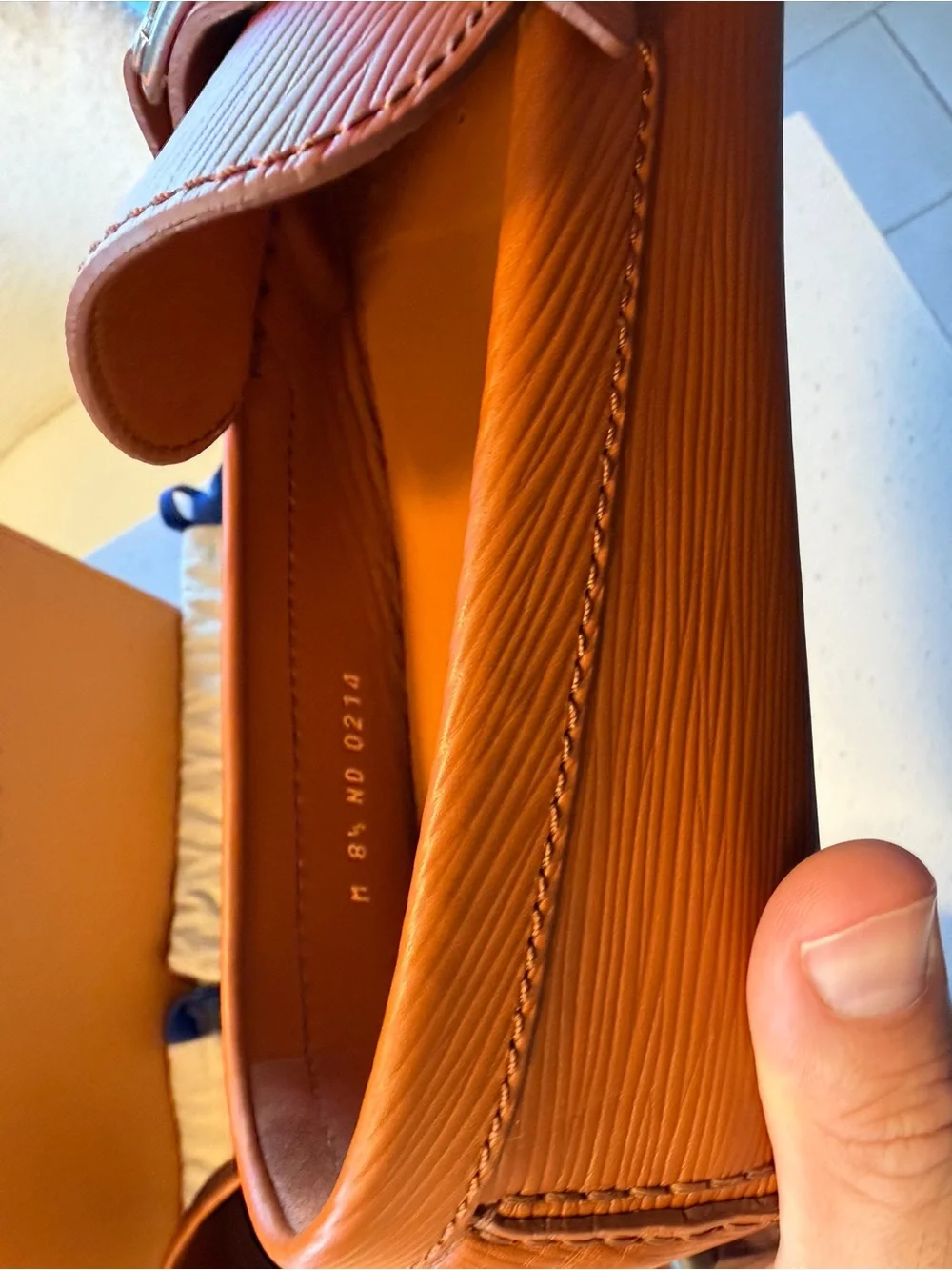 Louis Vuitton distinctive orange